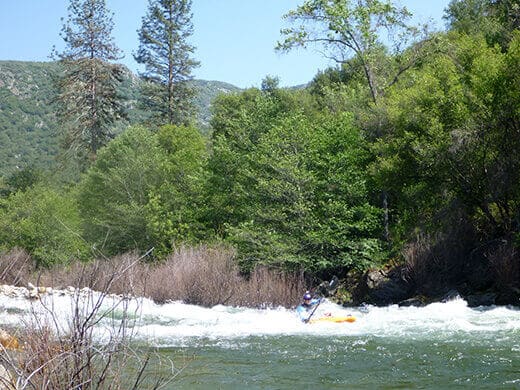 Powering through rapids on the Kings River