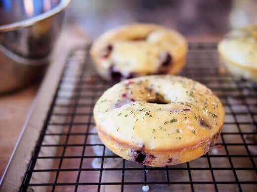Donuts dipped in basil-lemon glaze
