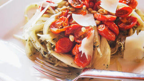 Zucchini Noodles With Roasted Tomatoes, Pesto, and Pine Nuts