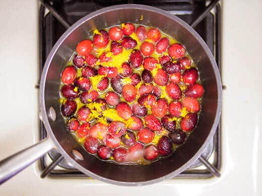 Heat cranberries until they start to burst