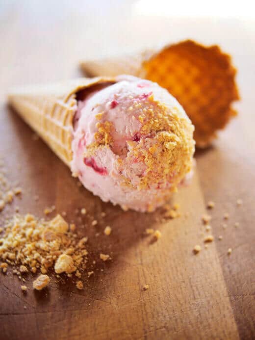 Cranberry cheesecake ice cream in a waffle cone