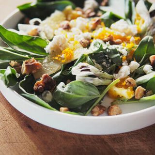 Seasonal salad with fava greens, fava flowers, and citrus