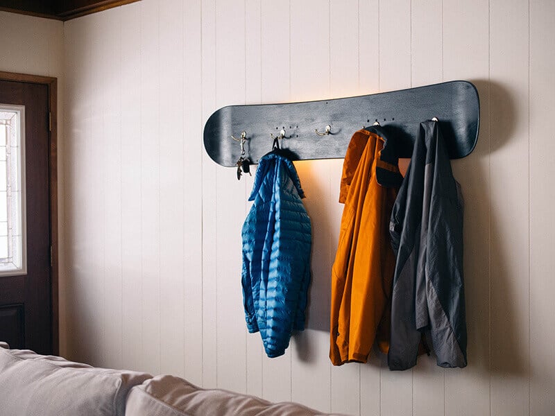 Snowboard coat rack
