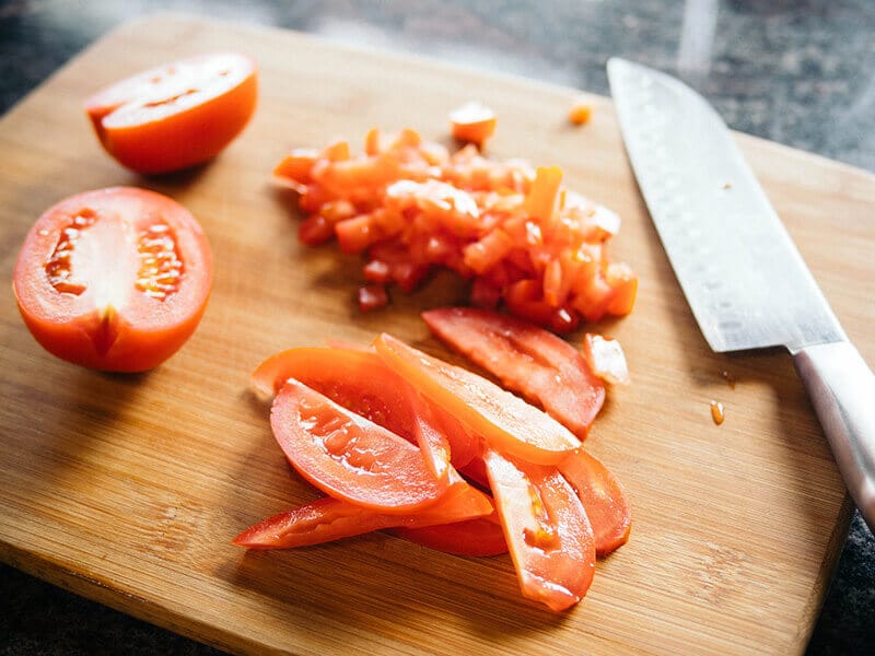Finely chop tomatoes