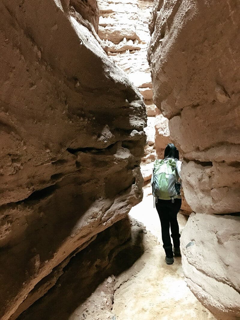 Exploring the narrow passageway of Ladder Canyon