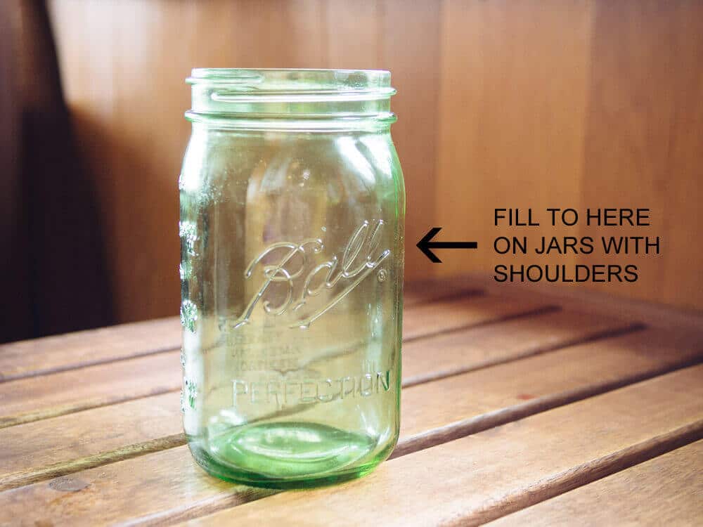Fill quart jars to no more than 1 inch below the shoulders