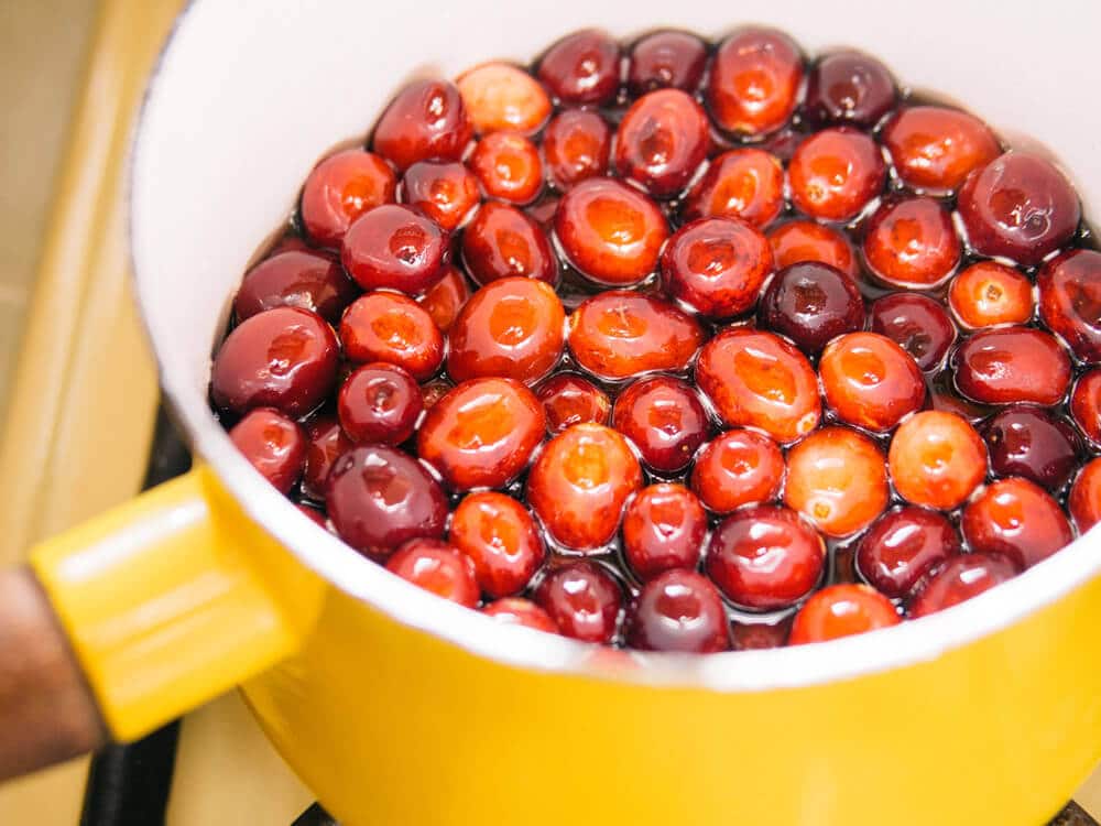 Fresh cranberries in simple syrup