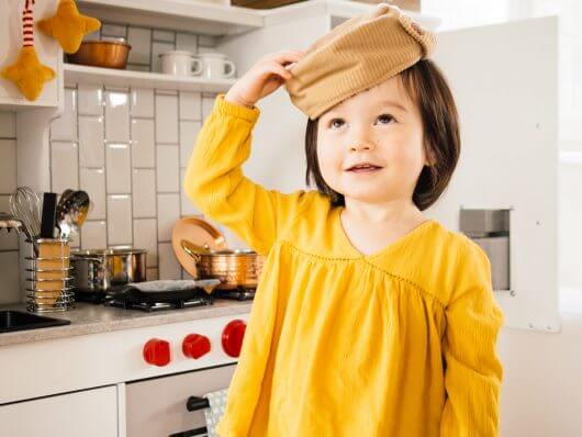 Fun in the toddler play kitchen