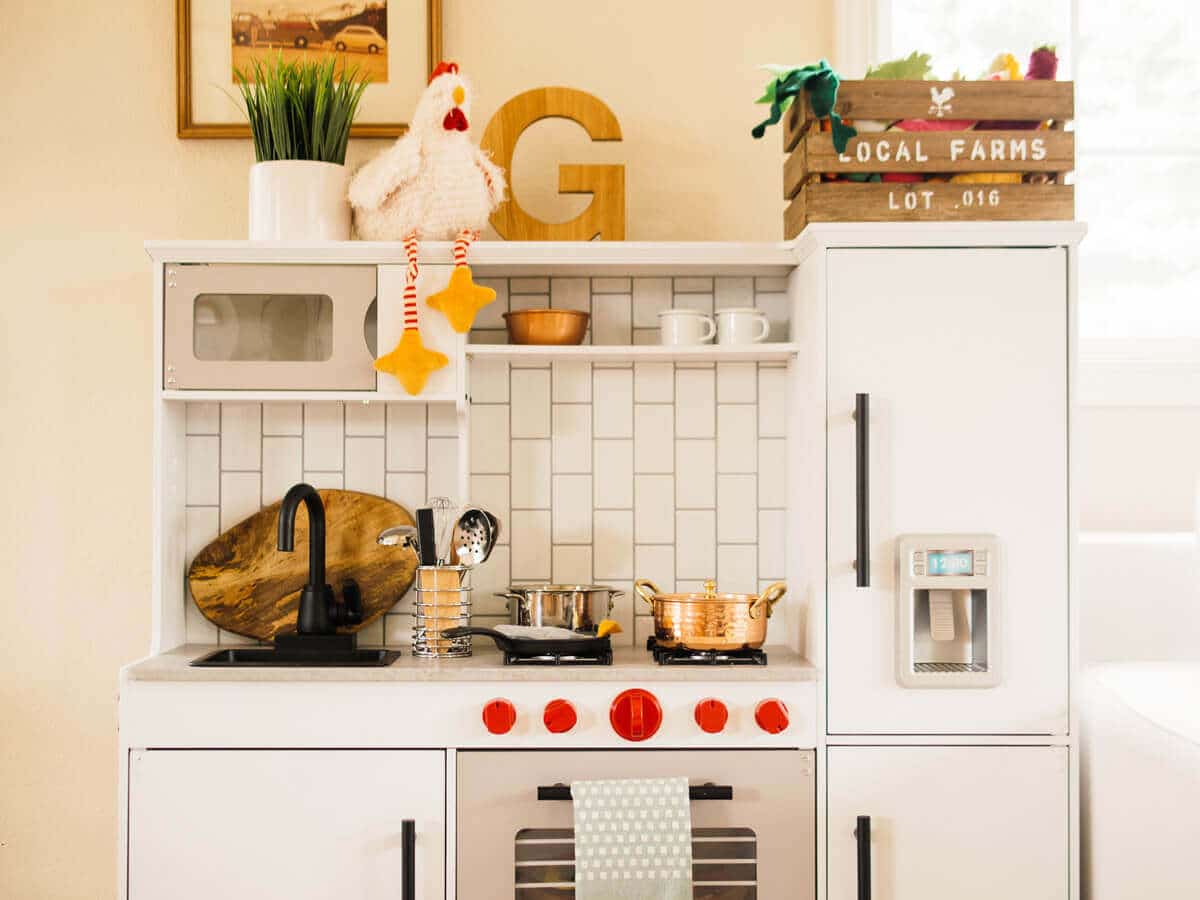 Airy, modern, and organic elements in a toddler play kitchen