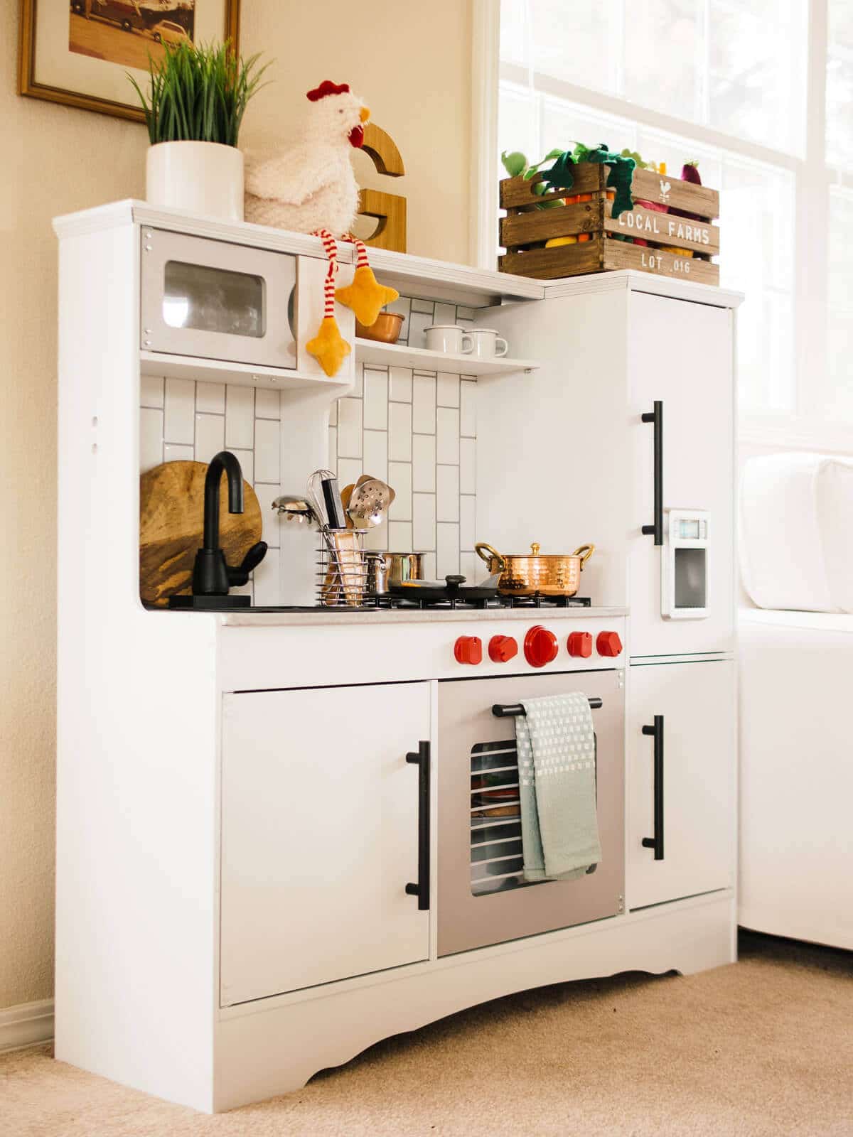 A warm and modern toddler play kitchen