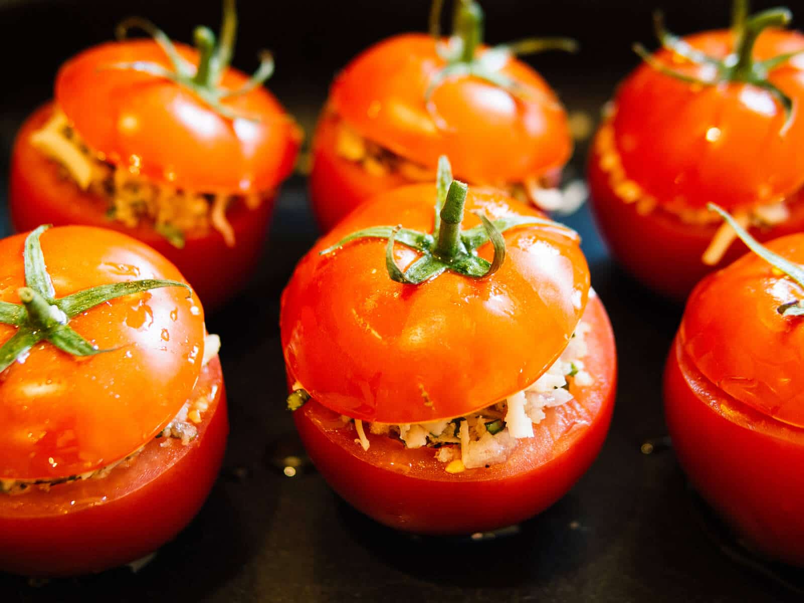 Plank-grilled stuffed tomatoes