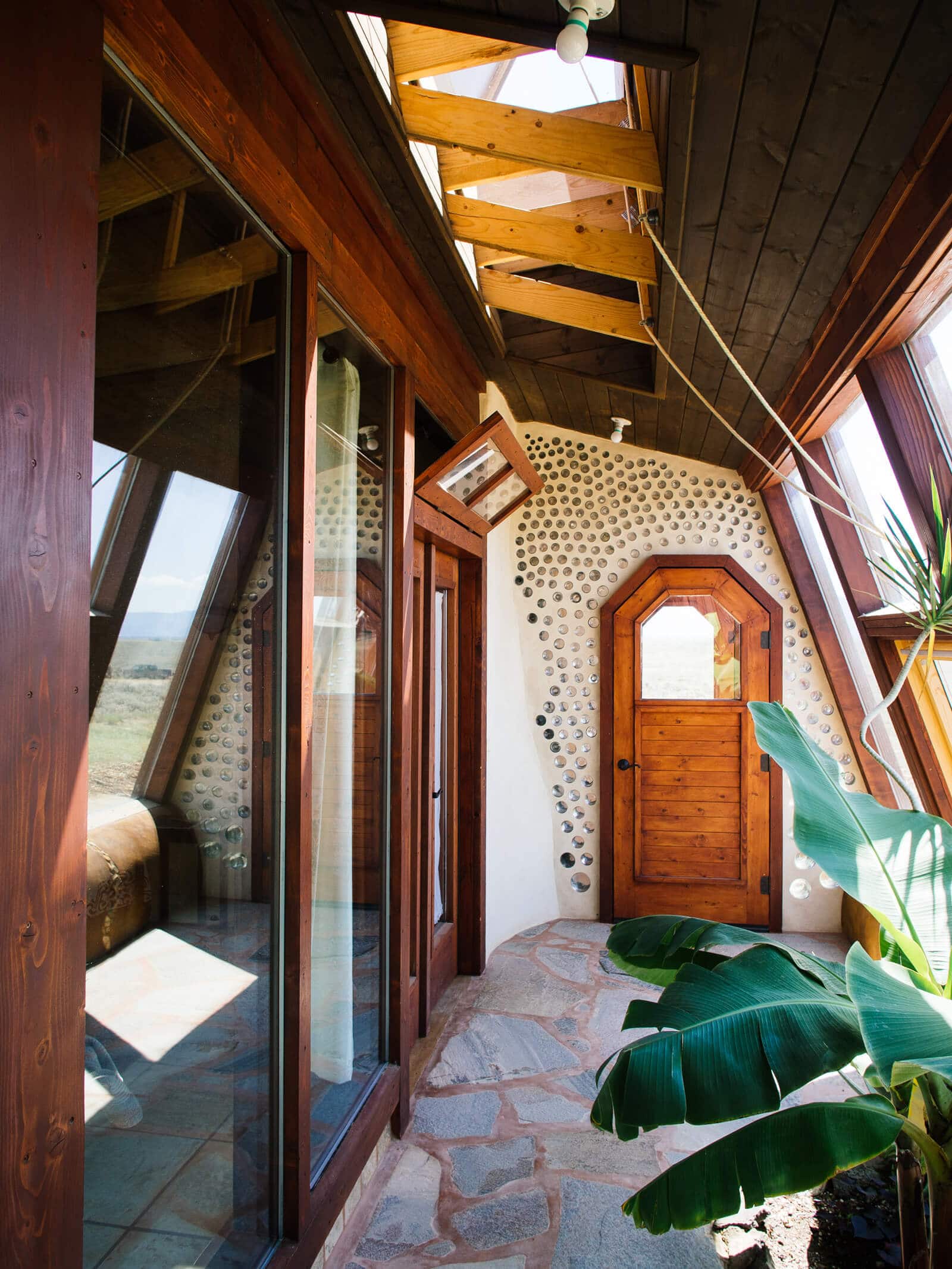 Letting in the breeze in an Earthship greenhouse