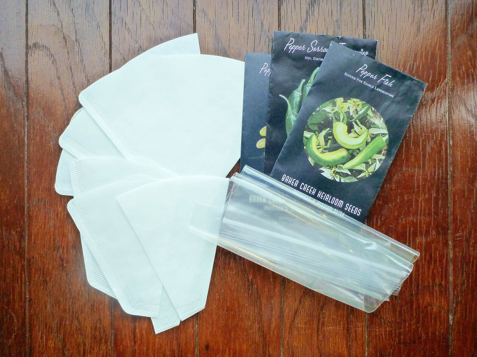 Gather your supplies for starting seeds in coffee filters