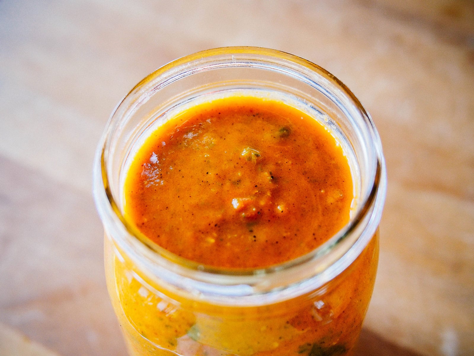 Homemade spicy minty tomato sauce in a jar