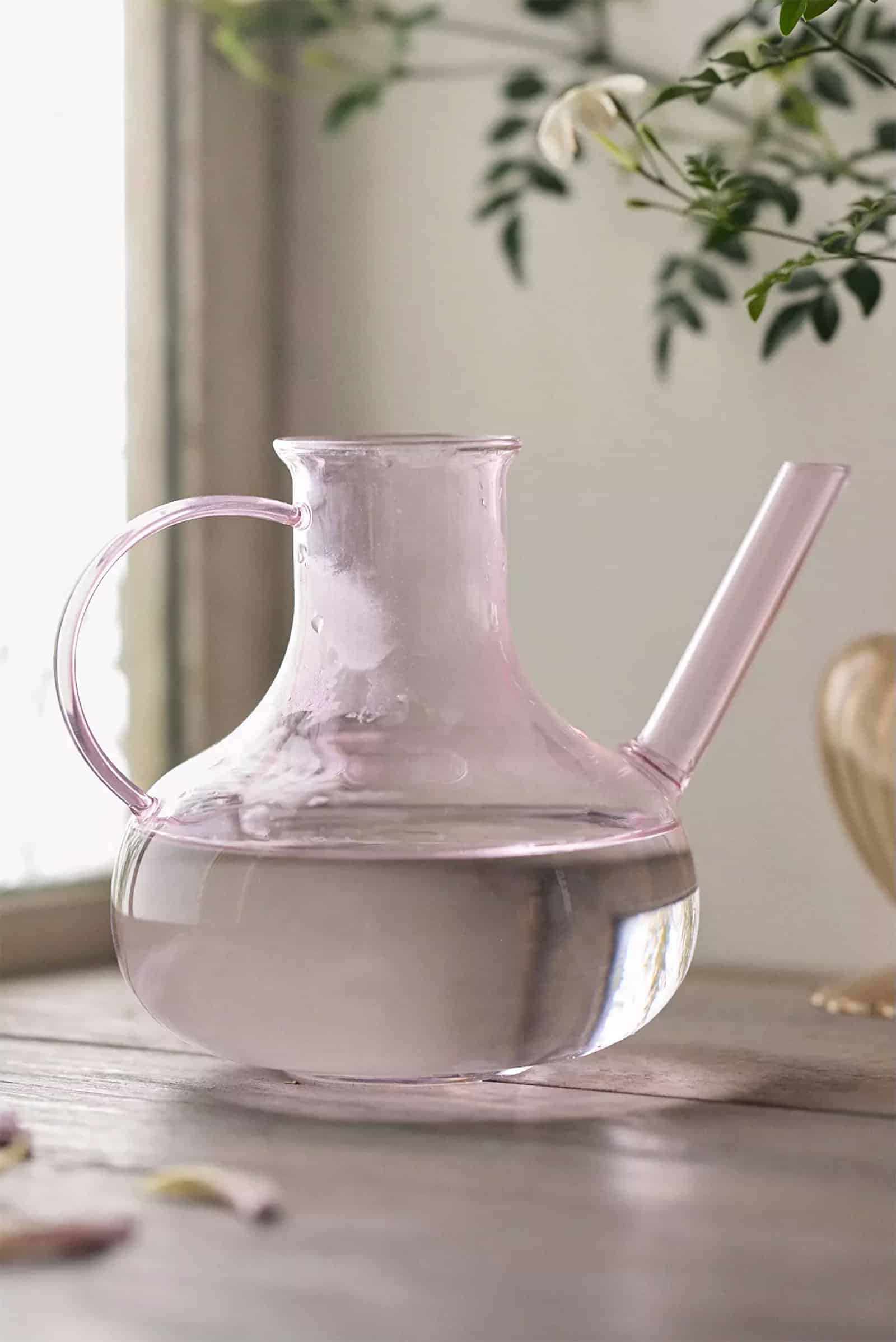 Rose glass watering can